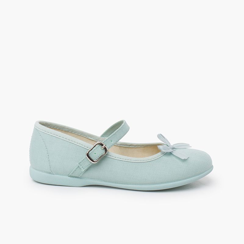 Ballerine con cinturino  fiocco lucido perlato