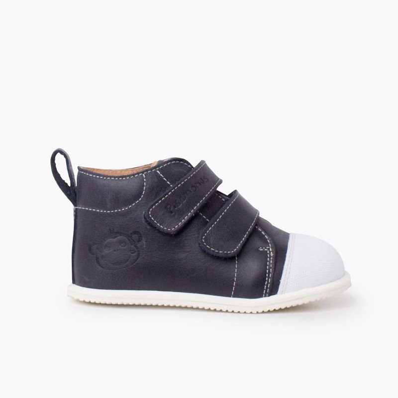 Stivaletto sportivo in pelle con punta bianca