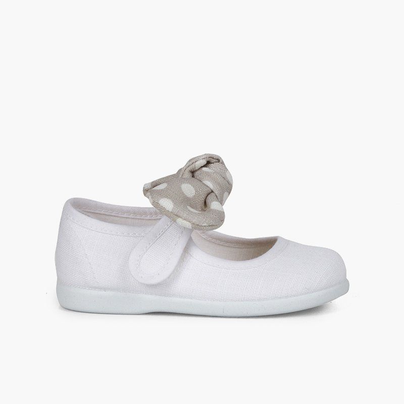 Ballerine con cinturino con fiocco a pois