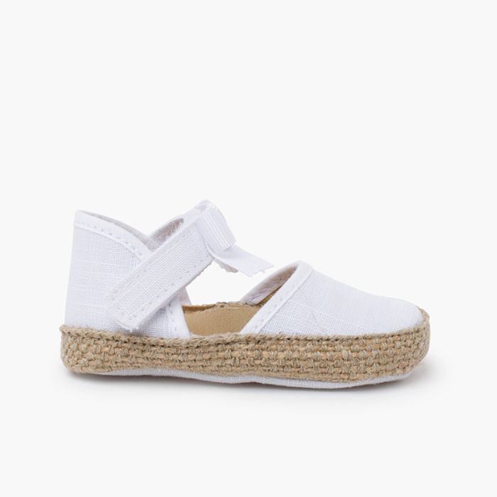 Espadrillas neonata decorate con fiocco e farfalla