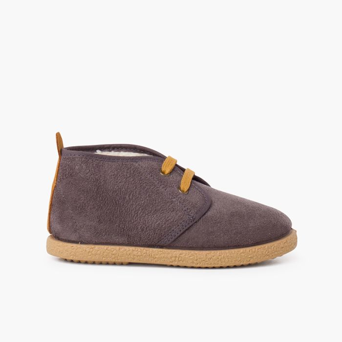 Stivaletti foderati in shearling con striscia posteriore 