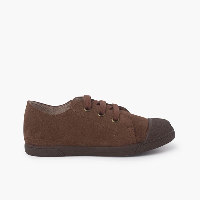 Scarpe sportive in pelle crosta con punta in gomma e lacci 