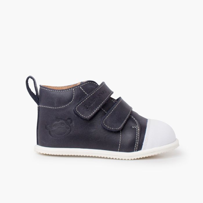 Stivaletto sportivo in pelle con punta bianca