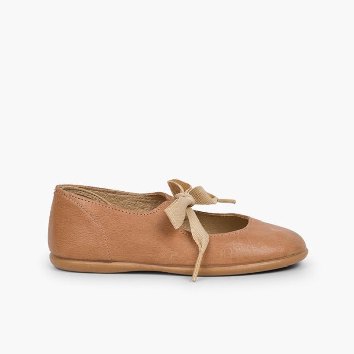 Ballerine cinturino fiocco pelle
